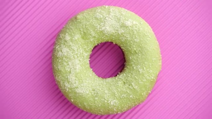 甜甜圈釉面特写。无缝循环。