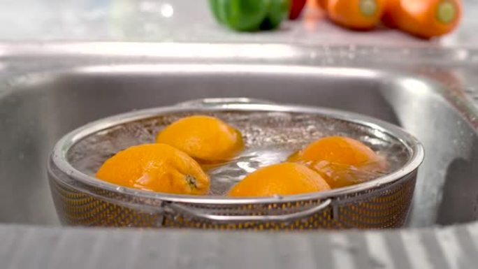 特写手洗橙色水果食材加工丰盛菜肴营养搭配