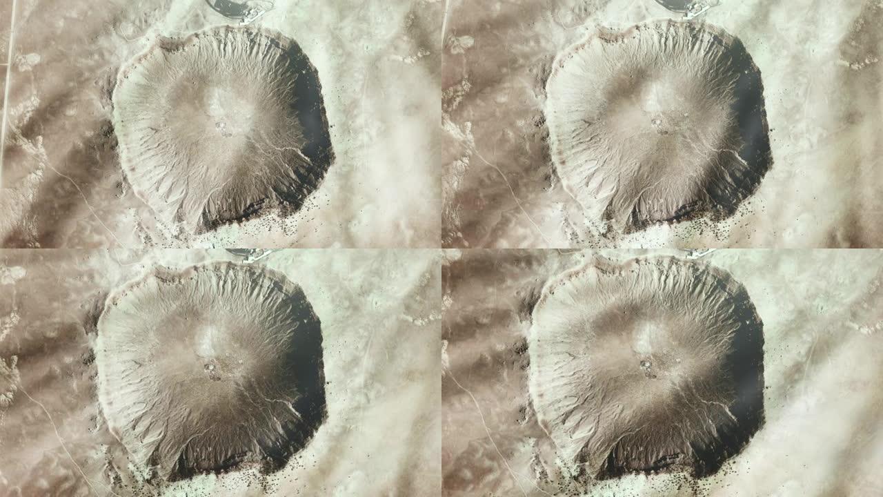 流星陨石坑，又称巴林杰陨石坑，在美国亚利桑那州北部沙漠，从太空看到。NASA提供的这段视频的元素。