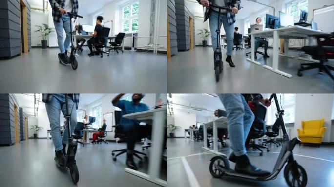 在办公办公空间中乘坐踏板车的低角度视图