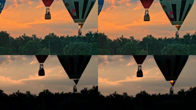 日出时的超级慢动作漂浮热气球