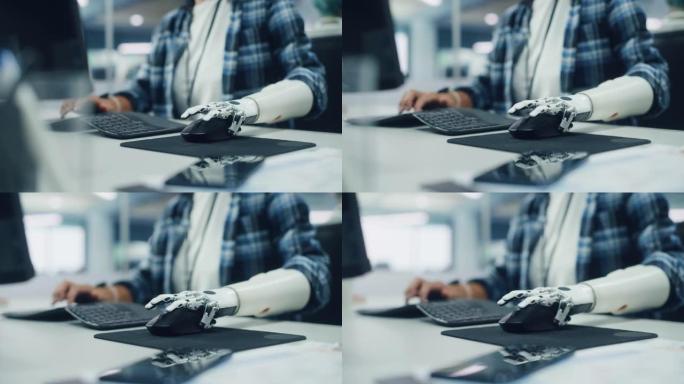 包容性办公室: 残疾人使用假肢在计算机上工作。专业具有先进的思想控制身体动力肌电仿生肢体控制小鼠。专