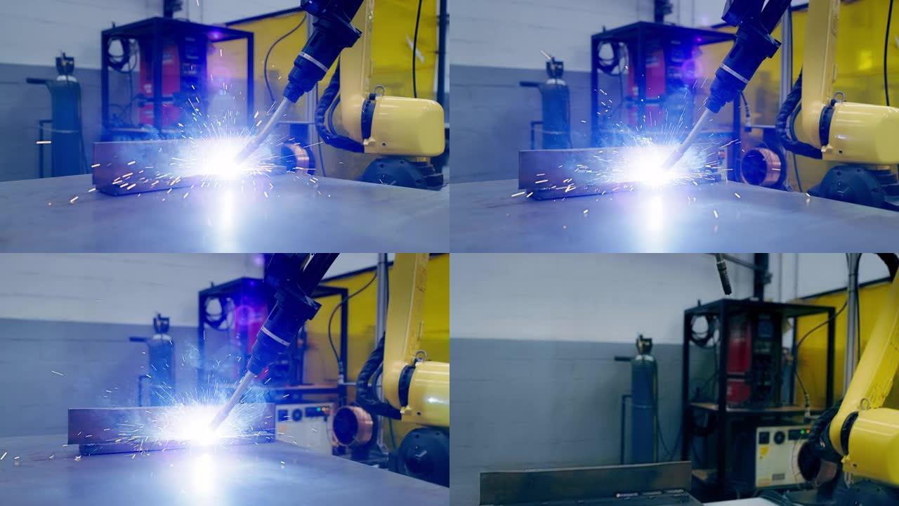 机械臂，工厂中的钢焊接和自动化，制造或工作中的AI精度。在仓库从事金属加工的机械臂，用于创新，数字和