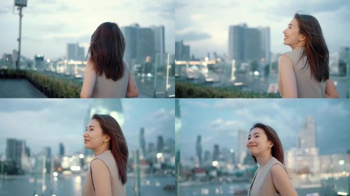 美丽的女人下班后花时间在城市休息。