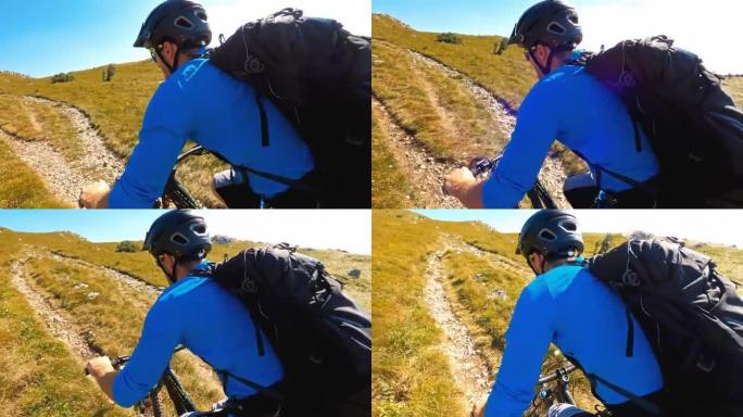山地自行车骑手在晴天骑自行车穿越落基山景观