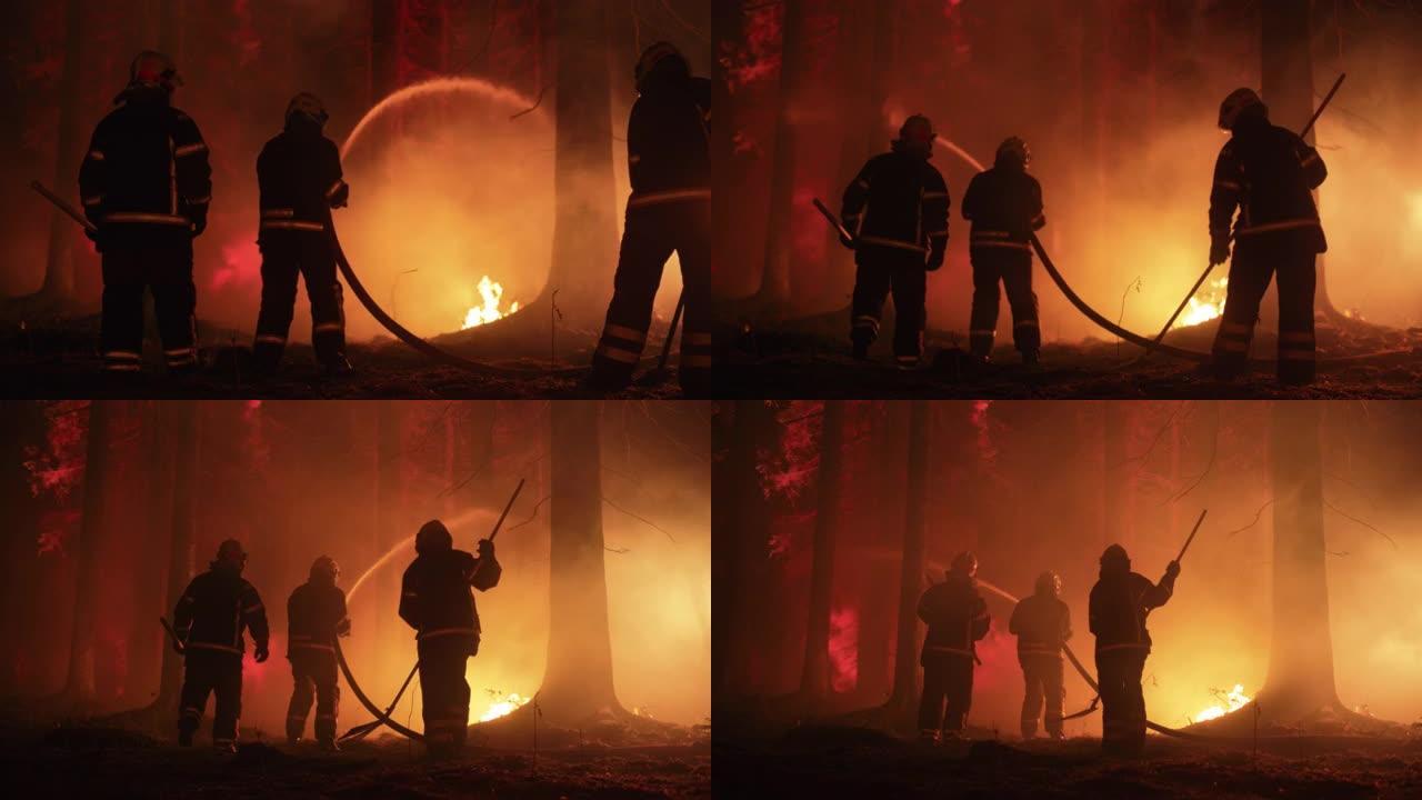 在大火完全失控之前，三名消防员带着消防，安全设备和防护制服包围了熊熊大火。消防员应对紧急野火。