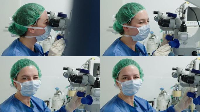 外科医生使用显微镜进行眼科手术