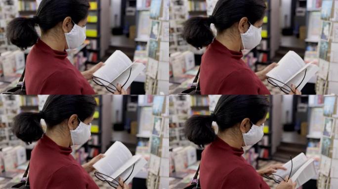 戴口罩的女人在商店买书