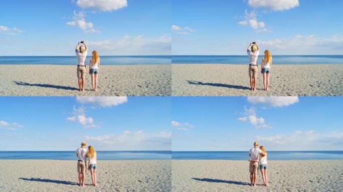 一对夫妇在海滩上一起自拍的4k视频片段