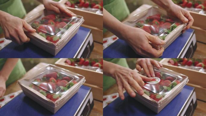 将草莓包装在容器中