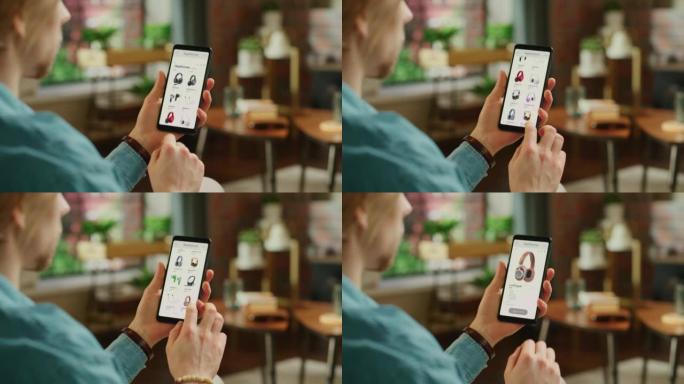 Man在电子产品的移动应用程序中使用智能手机进行在线购物，无线高保真耳机。在网站上购买，购买，订购技