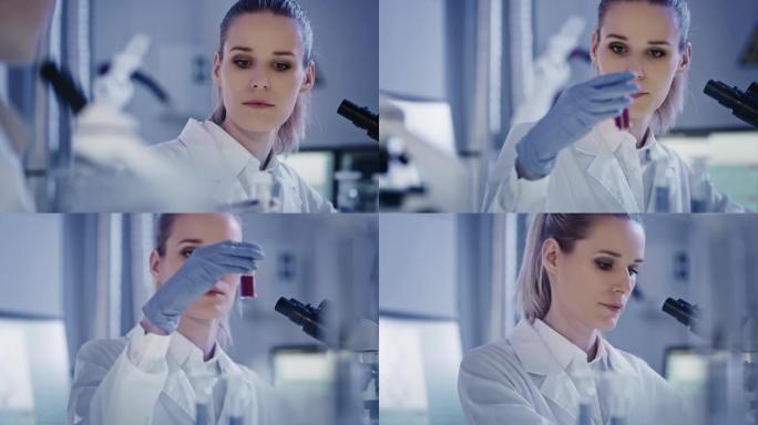 研究期间有吸引力的女性微生物学家。在未来实验室中使用显微镜