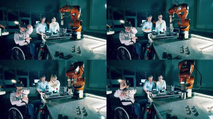 VR眼镜的残疾工程师正在现代实验室操作机械臂