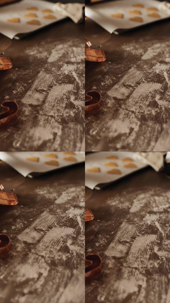 烤姜饼饼干时杂乱的桌子特写