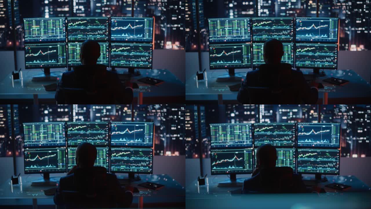 对冲基金交易员在一台具有多显示器工作站的计算机上工作，该工作站具有实时股票，商品和交易所市场图表。商