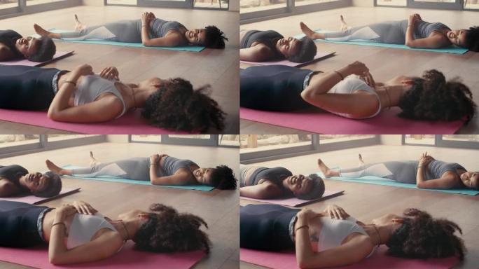 一群年轻女子在瑜伽训练后休息的4k视频片段