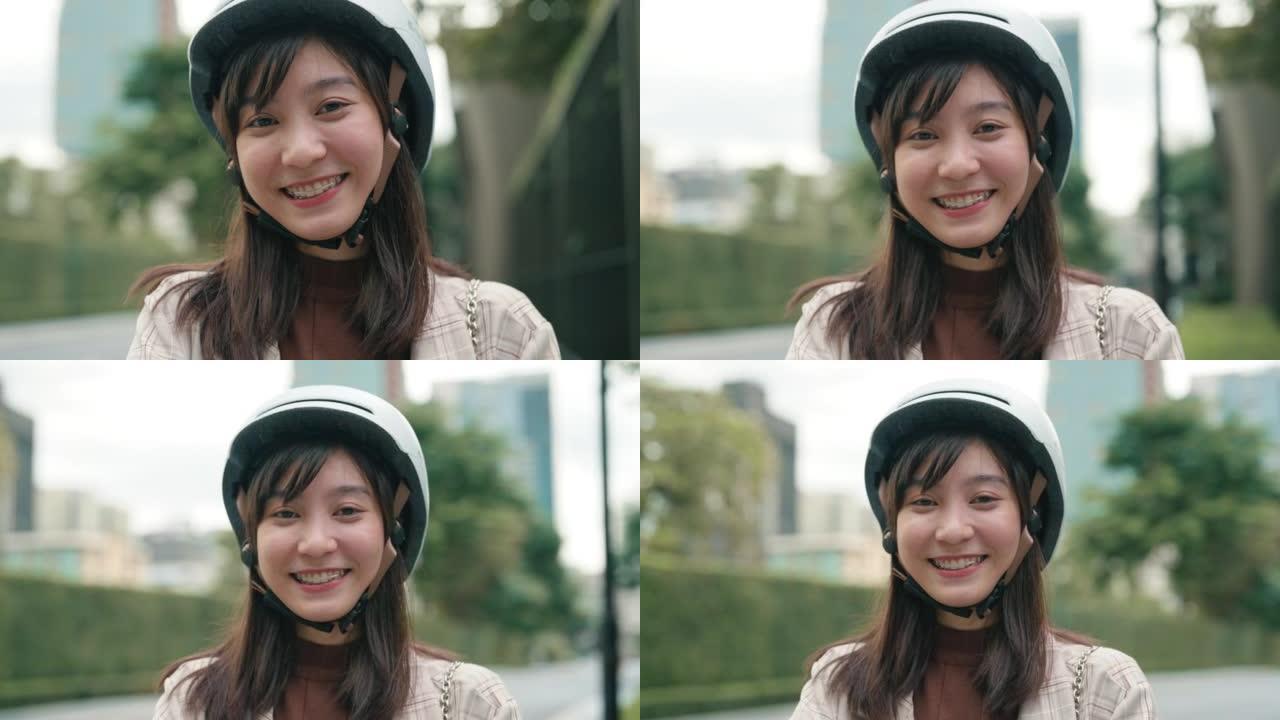 亚洲女商人驾驶踏板车可再生能源运输的肖像。