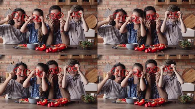 有趣的素食家庭制作辣椒粉圈眼镜在室内玩得开心