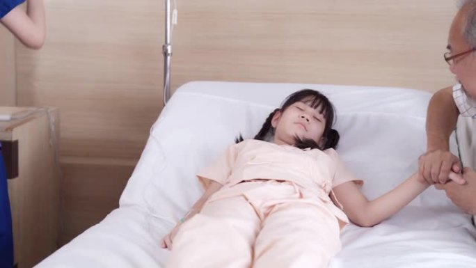 4K UHD多莉离开: 护士给医院病房的小女孩病人戴上氧气面罩。医院医疗保健概念。