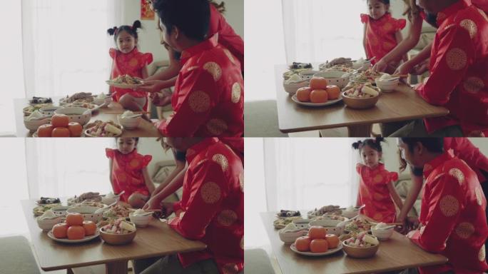 春节一家人吃饭。过年除夕年夜饭