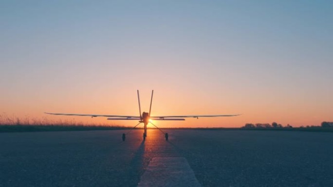 在美丽的日落背景下测试新的avia模型的飞行