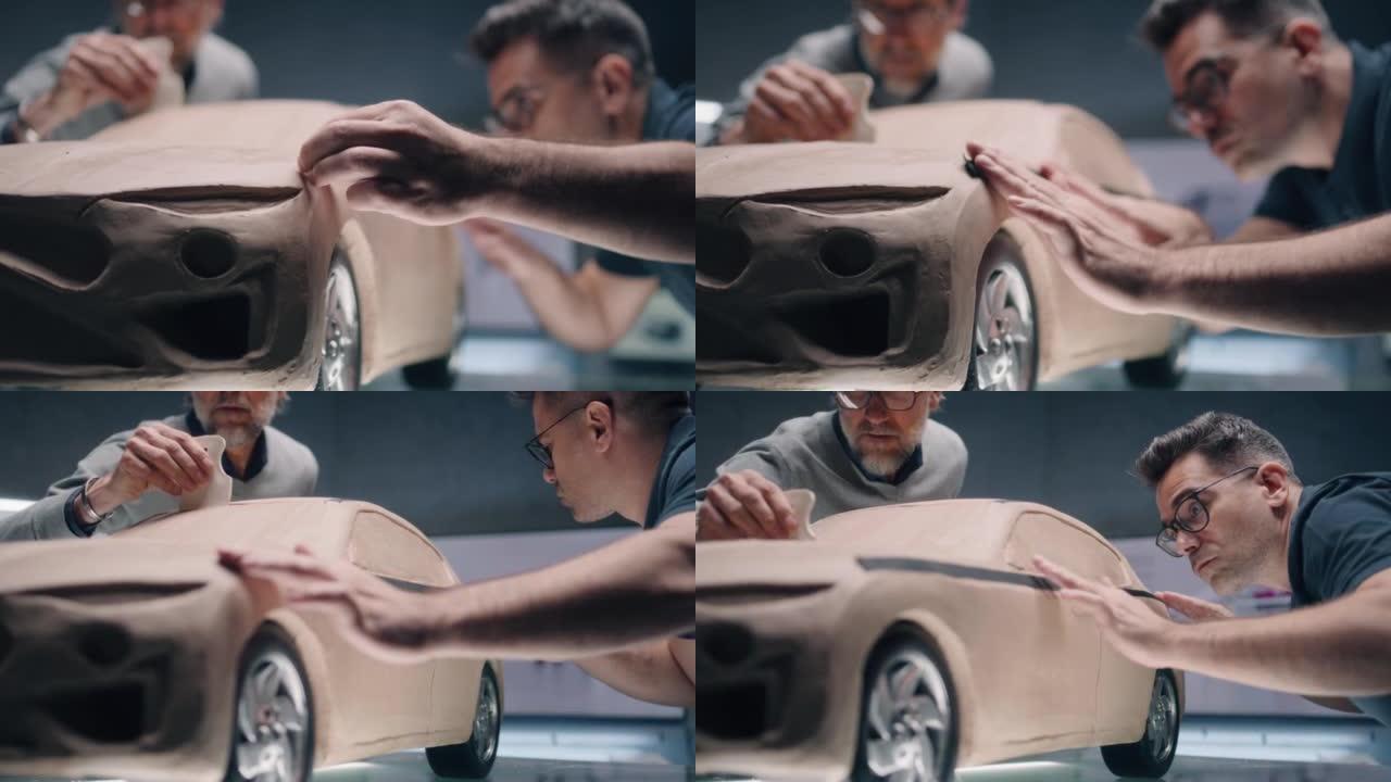 用粘土制作汽车原型的设计师