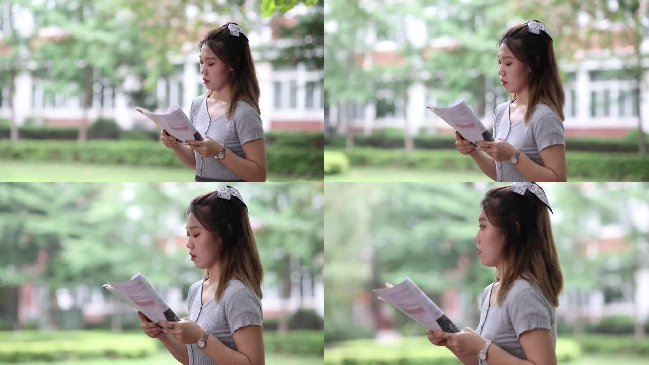 大学生女生读本亚洲大学生在校园读书看书