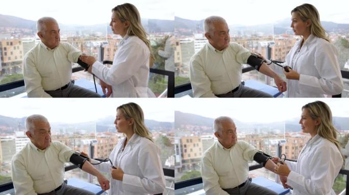 拉丁美洲女医生检查一名高级男子并测量其血压