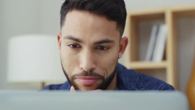 一名年轻商人在办公室工作时使用笔记本电脑的4k录像