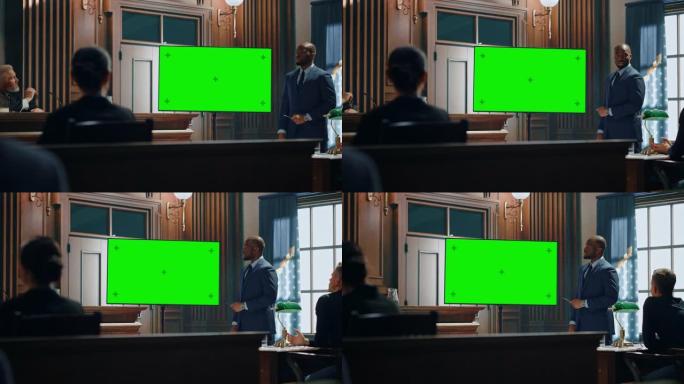 法庭开庭审理:魅力非凡的男性公设辩护人在绿色电视屏幕上向法官和陪审团展示证据的肖像。律师律师保护客户