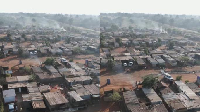 垂直视频。贫困。不平等。在拥挤和人口稠密的非洲城镇，贫民窟，棚户区，南非的鸟瞰图