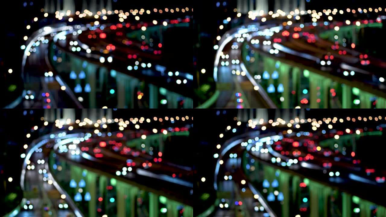 夜间立交桥和城市交通的T/L离焦视图