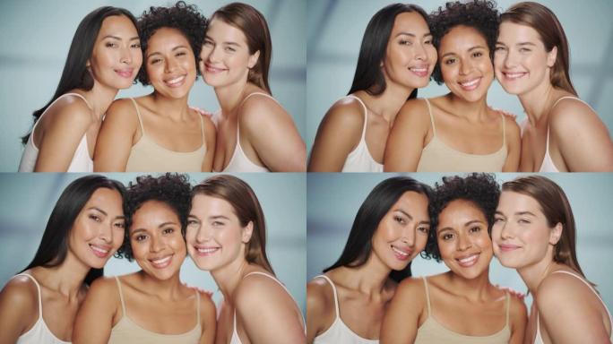 三个不同的多种族模型在孤立的背景上的美丽肖像。美丽快乐的亚洲，黑人和高加索妇女与自然，健康的皮肤。健