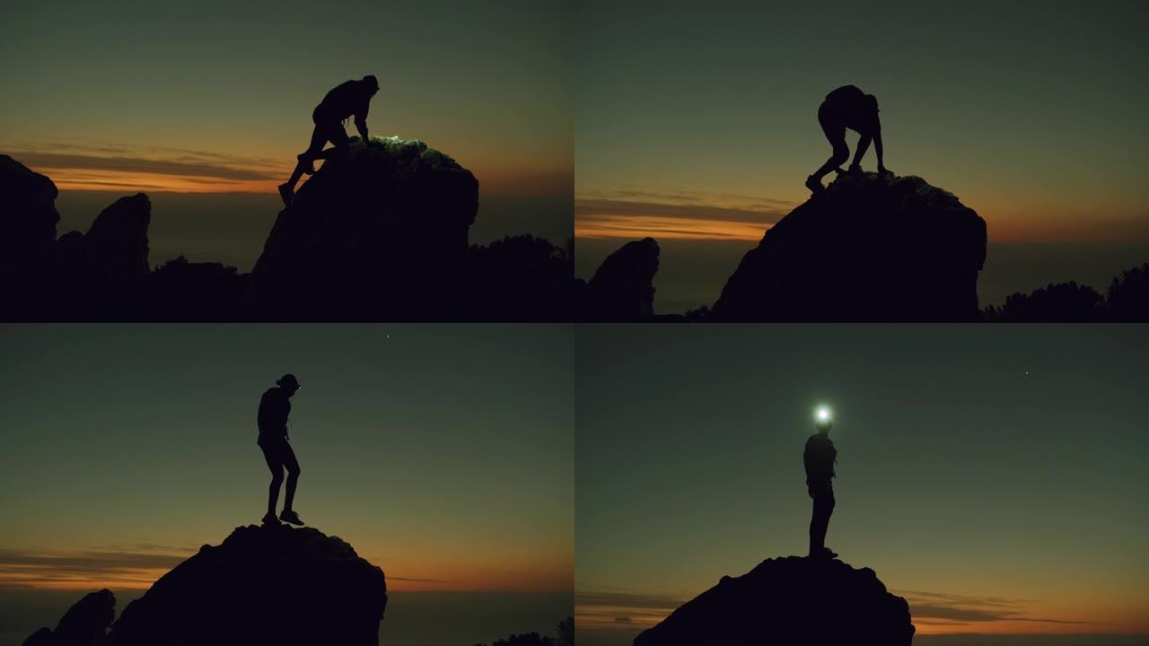 4k视频片段，一名妇女在登山时戴着头灯