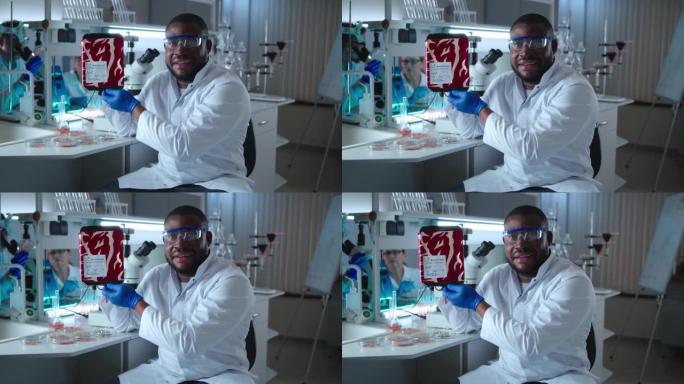 快乐的非洲裔美国男子展示实验室肉