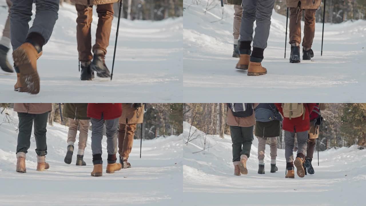 无法识别的人在冬季徒步旅行