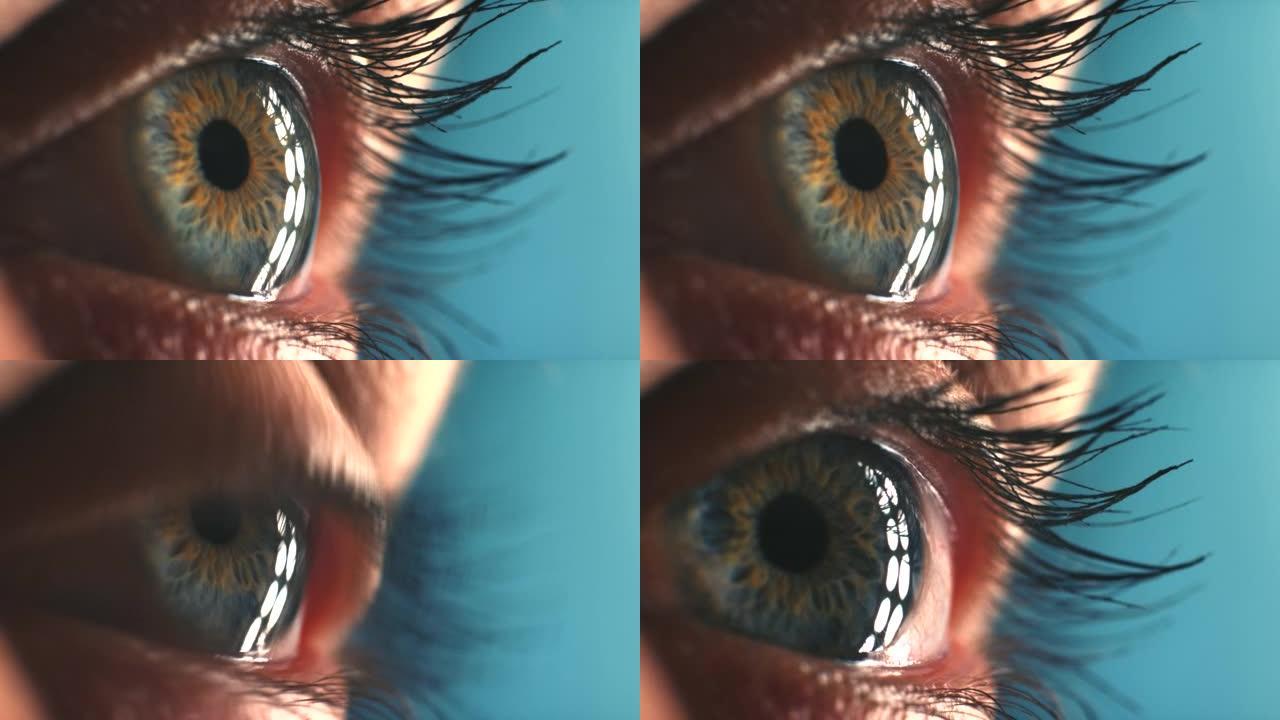 一个女人的特写镜头，具有健康视力的绿眼或视力的验光治疗。一个女孩的特写镜头，一个移动或扩张的瞳孔，具