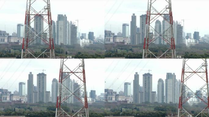 从船的桥上可以看到阿根廷布宜诺斯艾利斯的马德罗港地区的电信塔和摩天大楼。