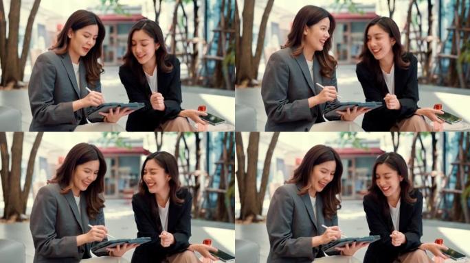 两名使用无线技术外出工作的职业女性。