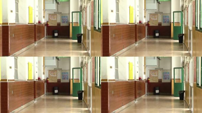 阿根廷布宜诺斯艾利斯冠状病毒大流行期间，一所封闭的公立学校的空走廊。放大。