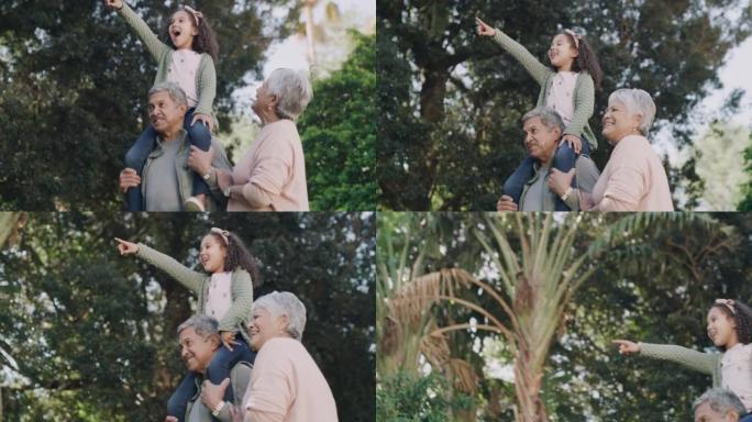 快乐，无忧无虑，顽皮的祖父母在自然公园与孙女在户外玩耍。年轻女孩和她的祖父和祖母一起享受周末