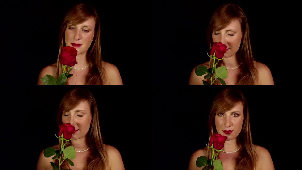 闻红玫瑰的赤裸女人