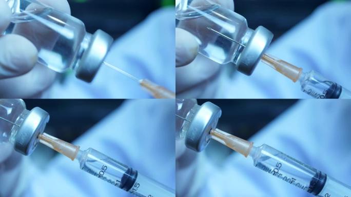 医疗手和注射器正在实验室接种疫苗