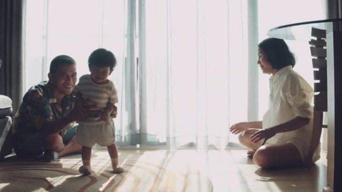 亚洲婴儿在家向父母迈出的第一步