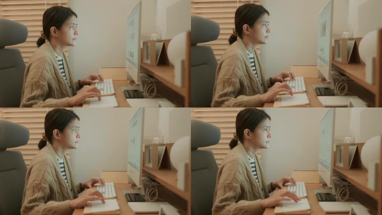 女大学生视频会议居家办公台式电脑设计师