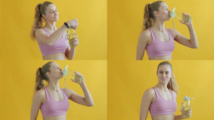 可爱的女运动员从可重复使用的瓶子里喝水并微笑的肖像