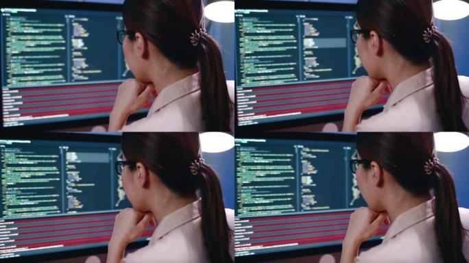 女人晚上检查代码用计算机语言输入计算机代码