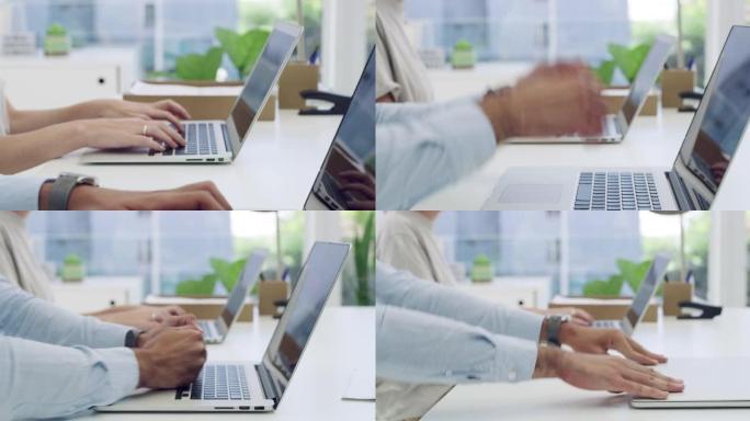 4k视频片段，一个无法识别的商人与同事坐在一起，并在使用笔记本电脑时生气