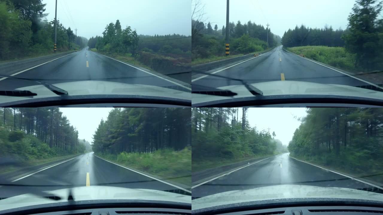 司机在雨中查看林道