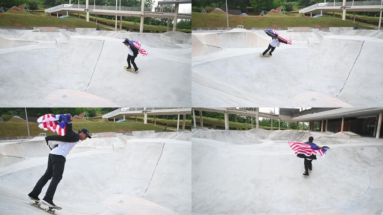 一名年轻的马来西亚男子在公共公园玩马来西亚国旗滑板